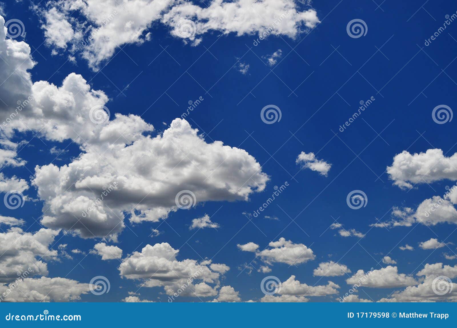  - white-fluffy-clouds-blue-sky-17179598