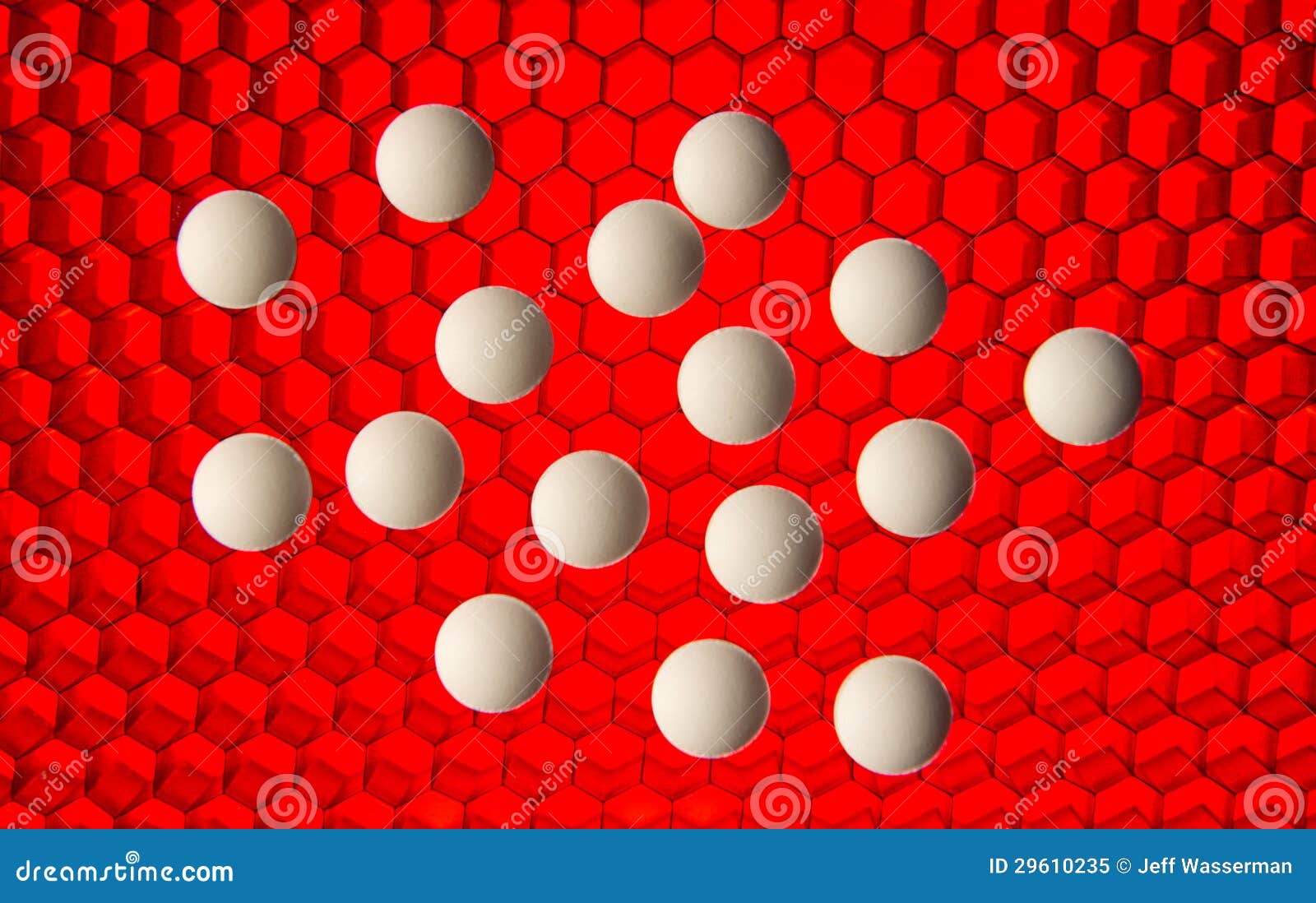 White Pills On A Red High Tech Grid Background Royalty