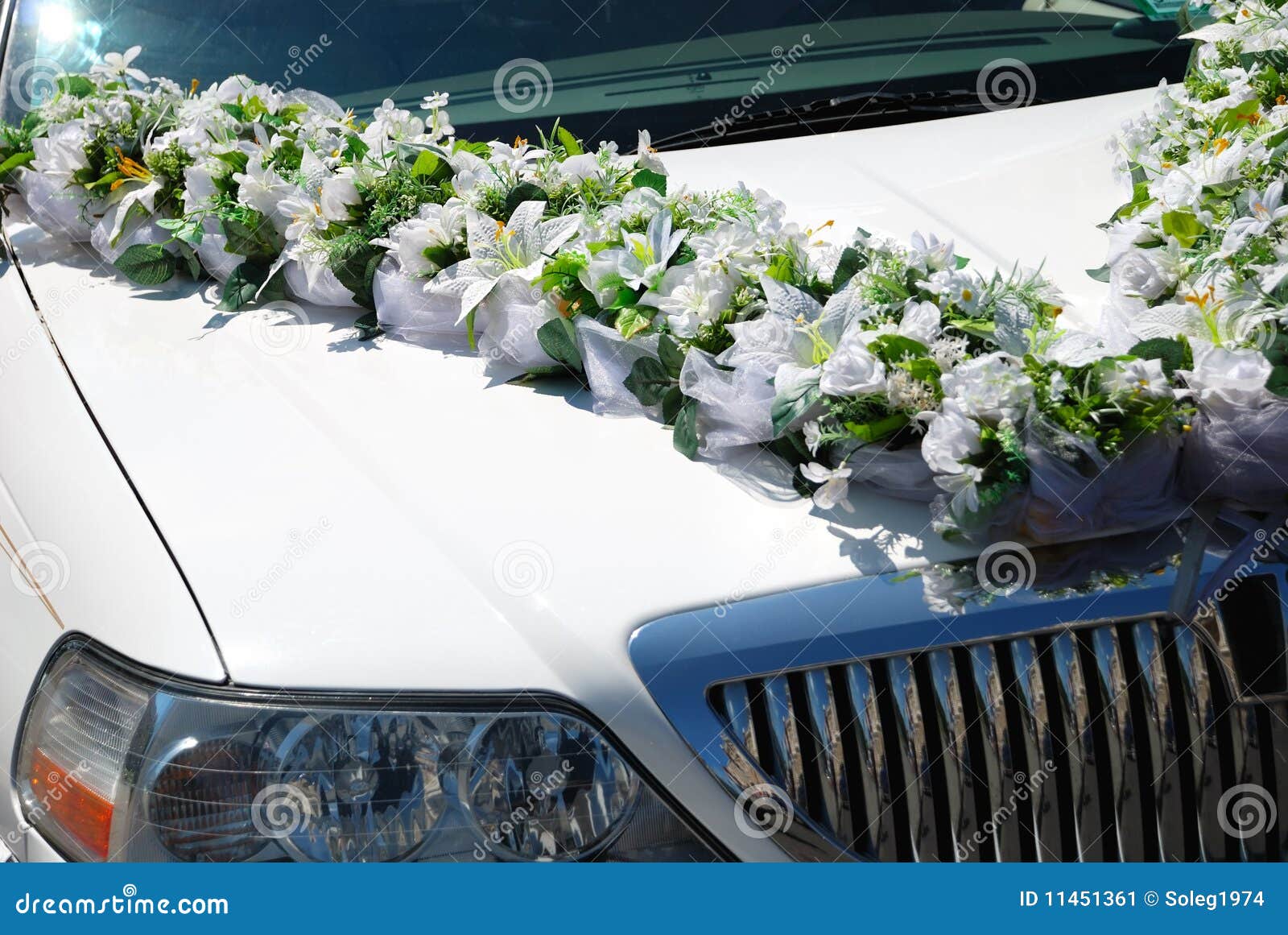 Wedding limousines with flowers