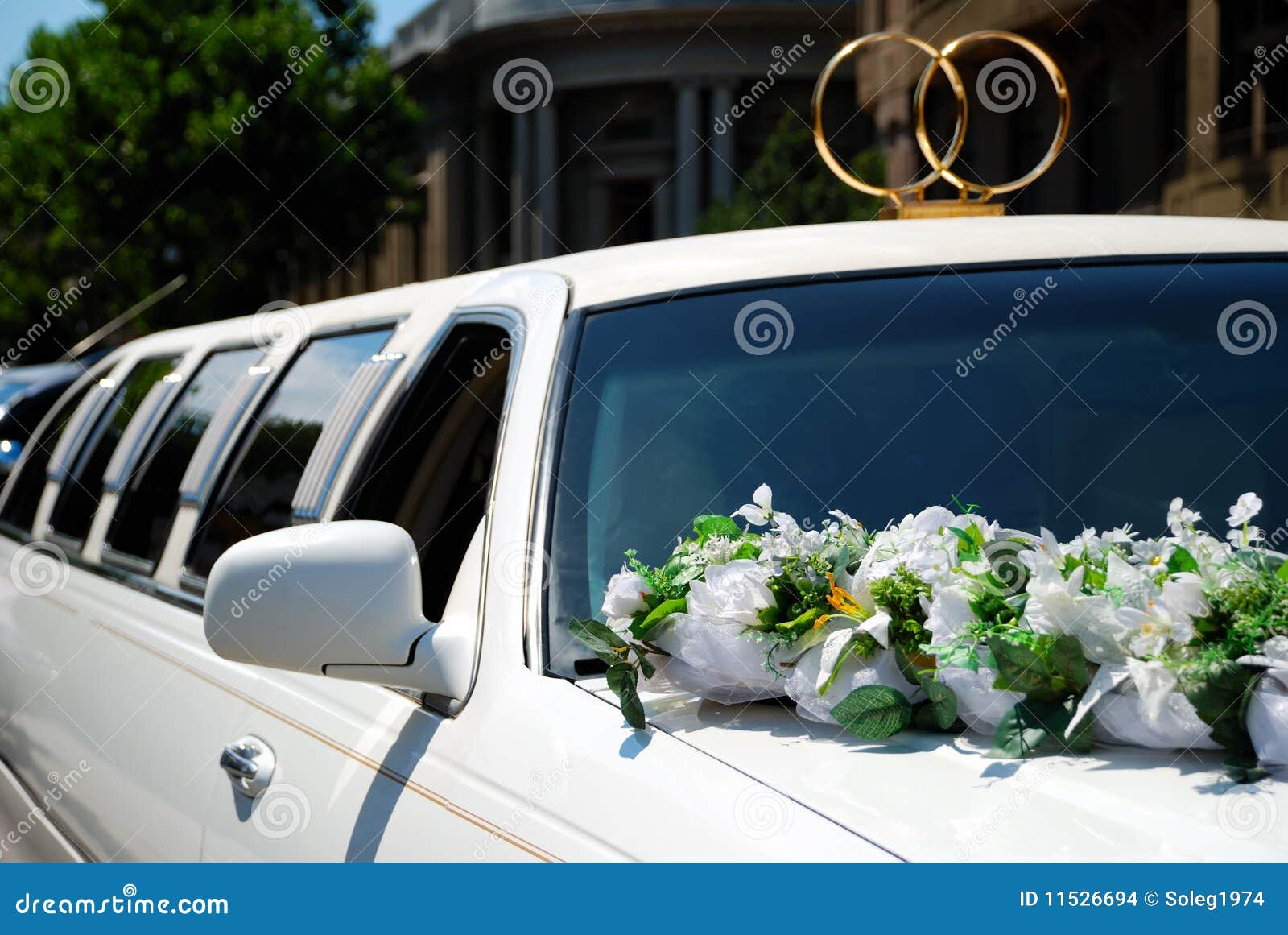 Wedding limousines with flowers