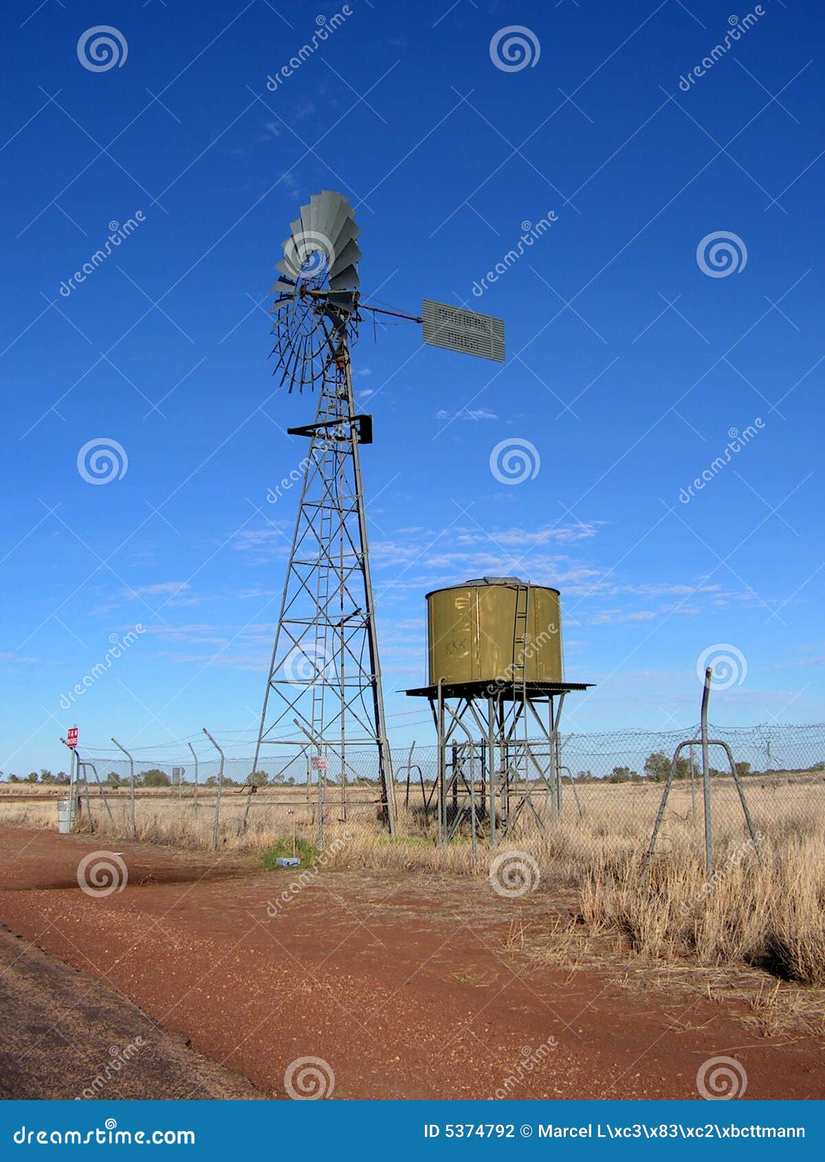 Wind Mill Water Pump With Tank Stock Photography - Image: 5374792