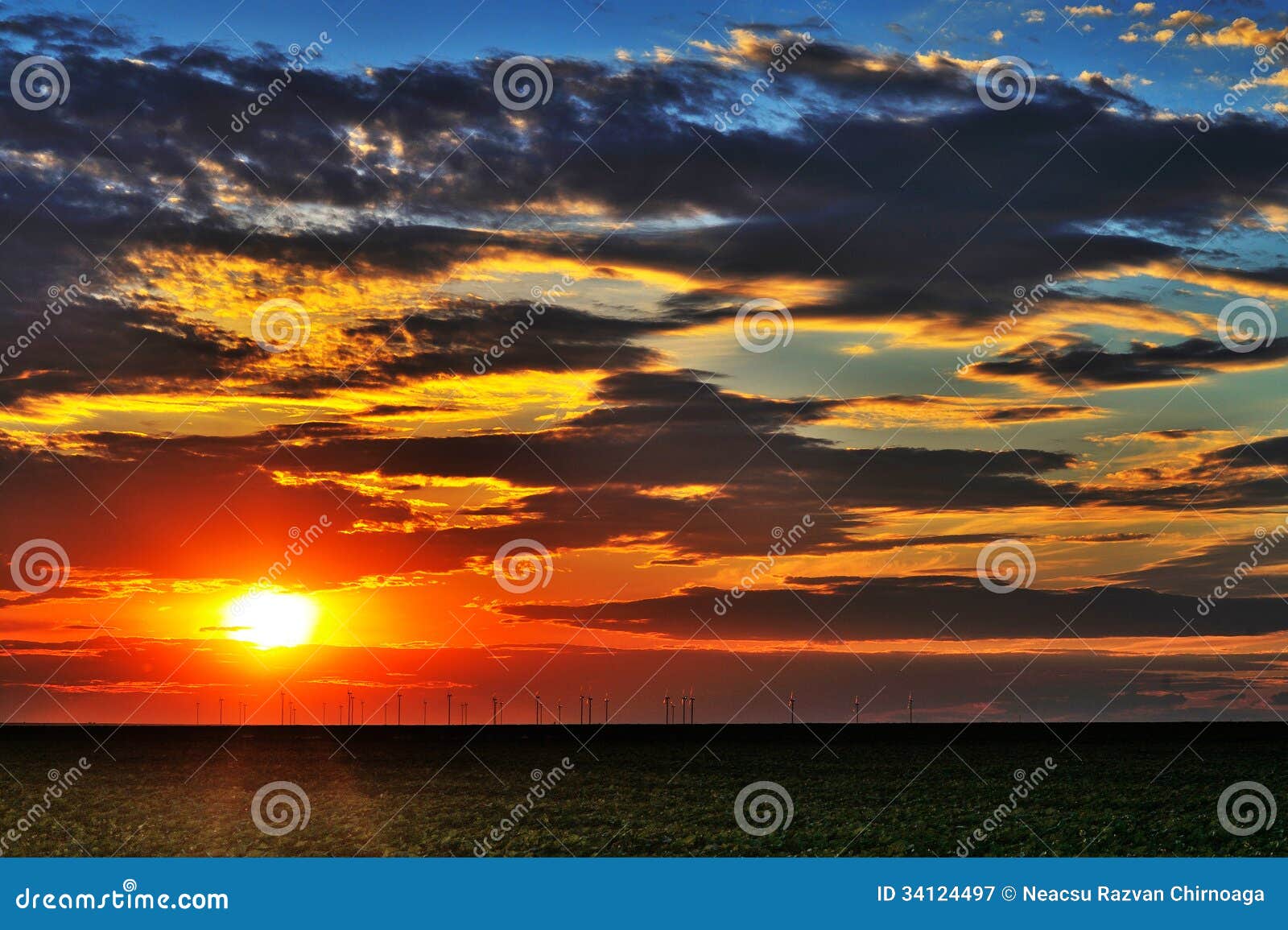 Wind Turbine Farm Over Sunset Royalty Free Stock Photography - Image 