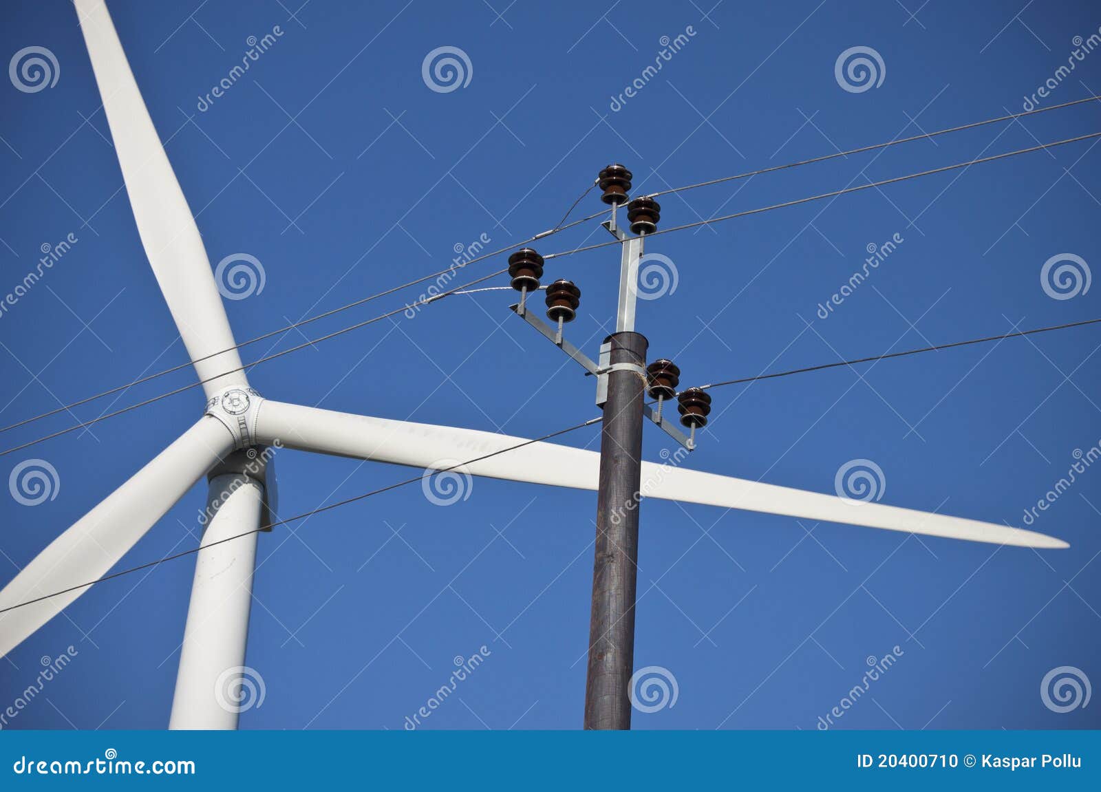 Windmill blades and electric lines located Pakri, Estonia. Photo taken 
