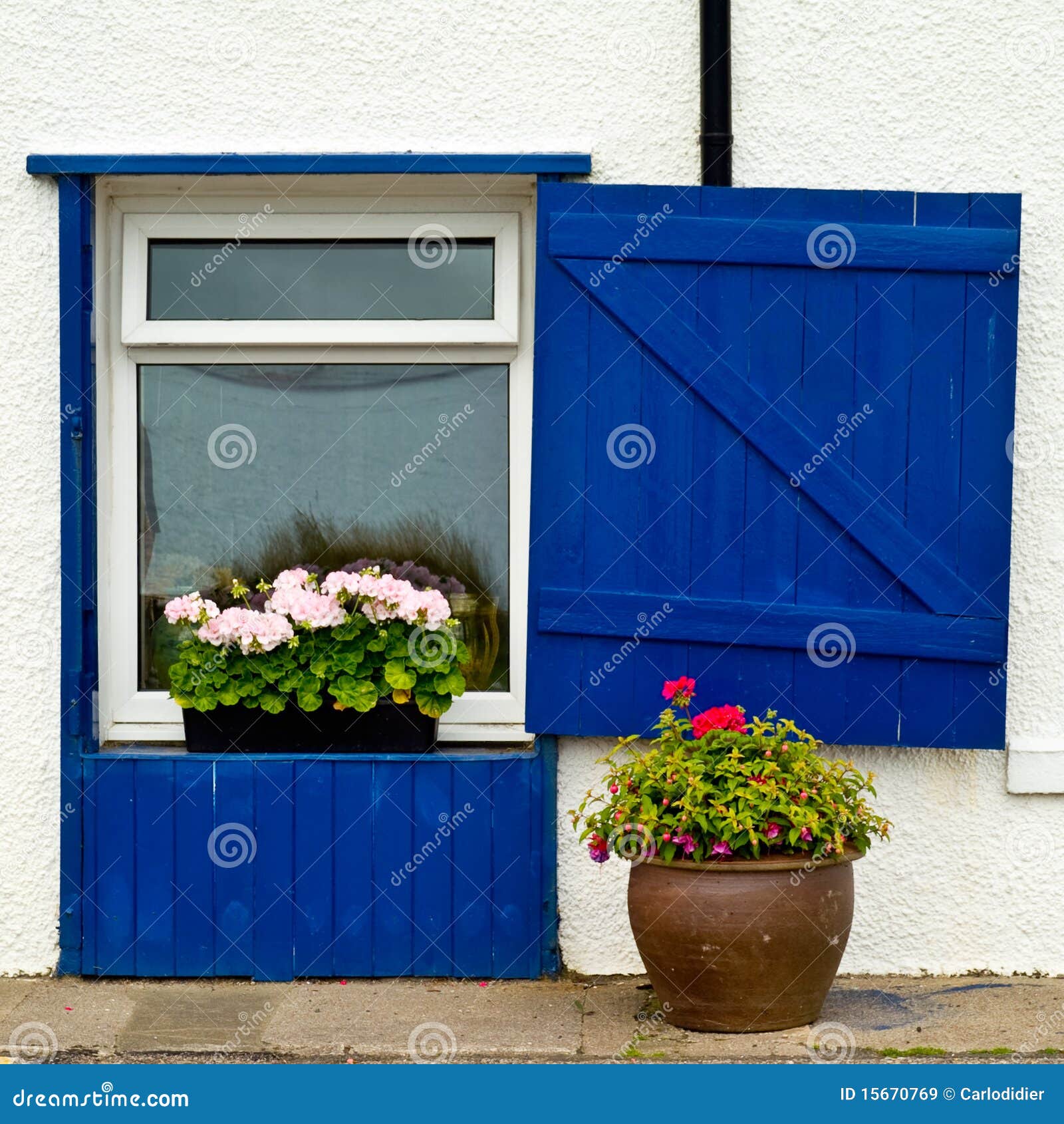 Window With Blue Wooden Blinds And Flowers Royalty Free Stock Images 
