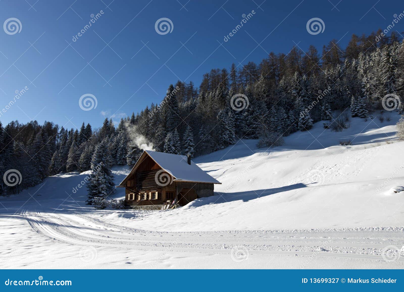Royalty Free Stock Photography: Winter scenery with log cabin