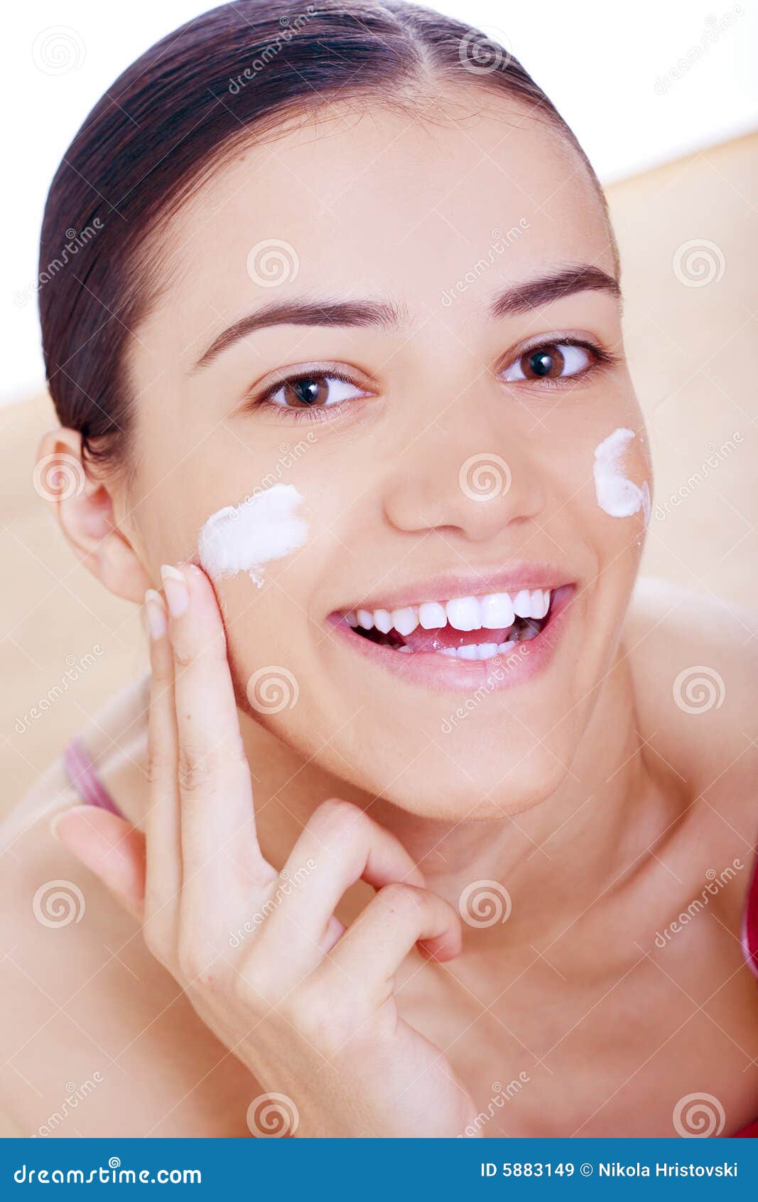 Cream on her face Cream on her face