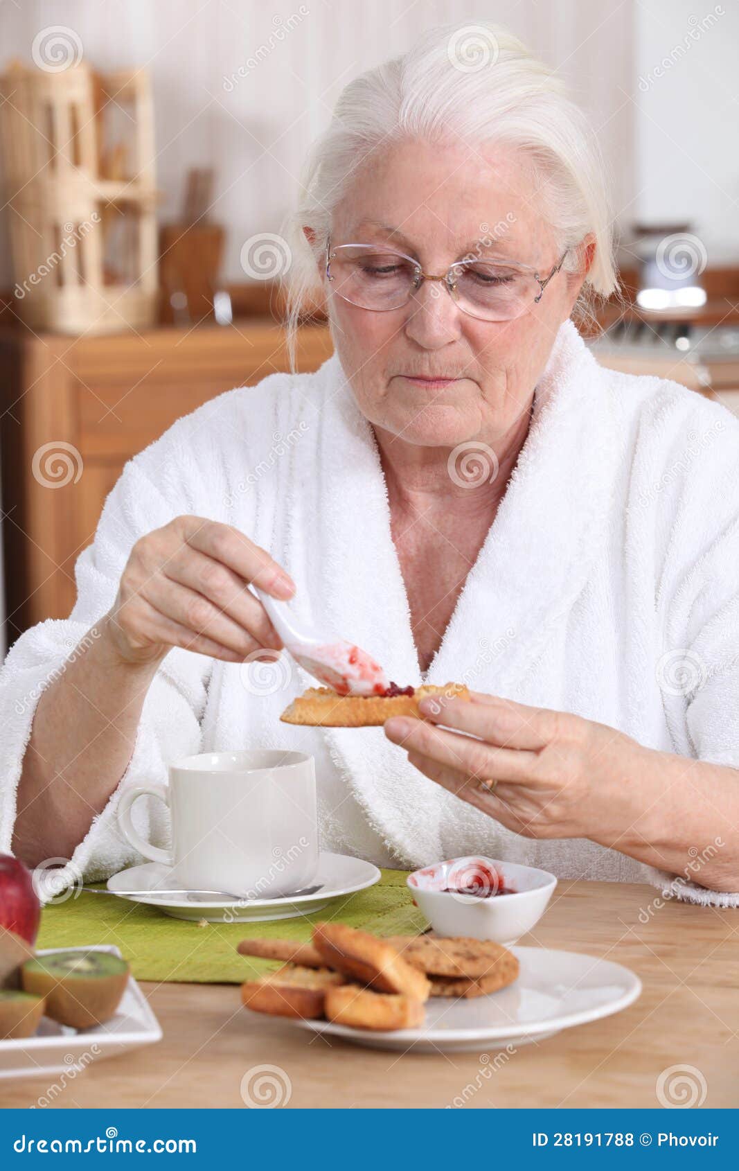 Woman Eating Breakfast Royalty Free Stock Photos - Image: 28191788