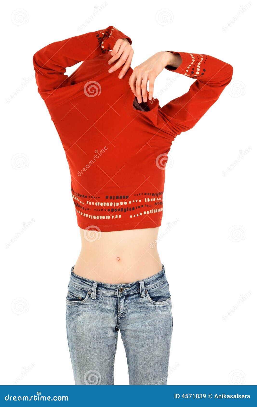 Woman In Jeans Takes Off An Orange Shirt Royalty Free Stock Images