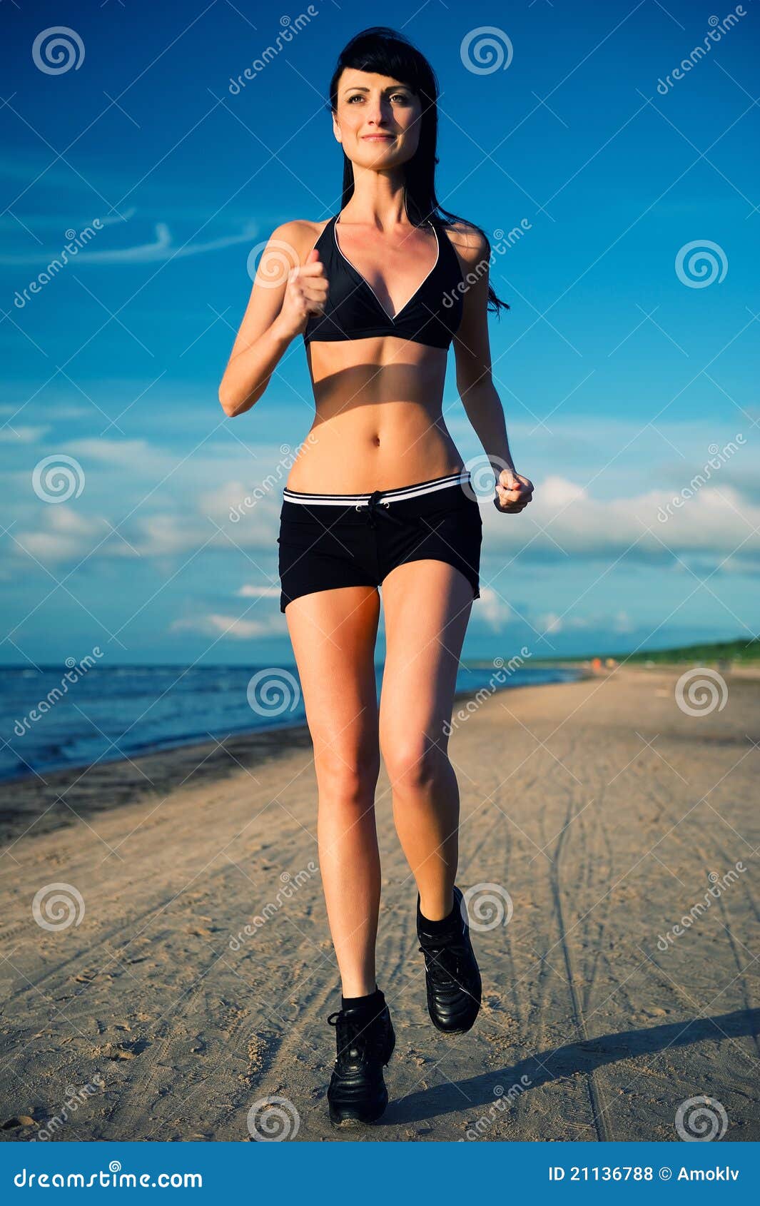 woman-jogging-beach-21136788.jpg