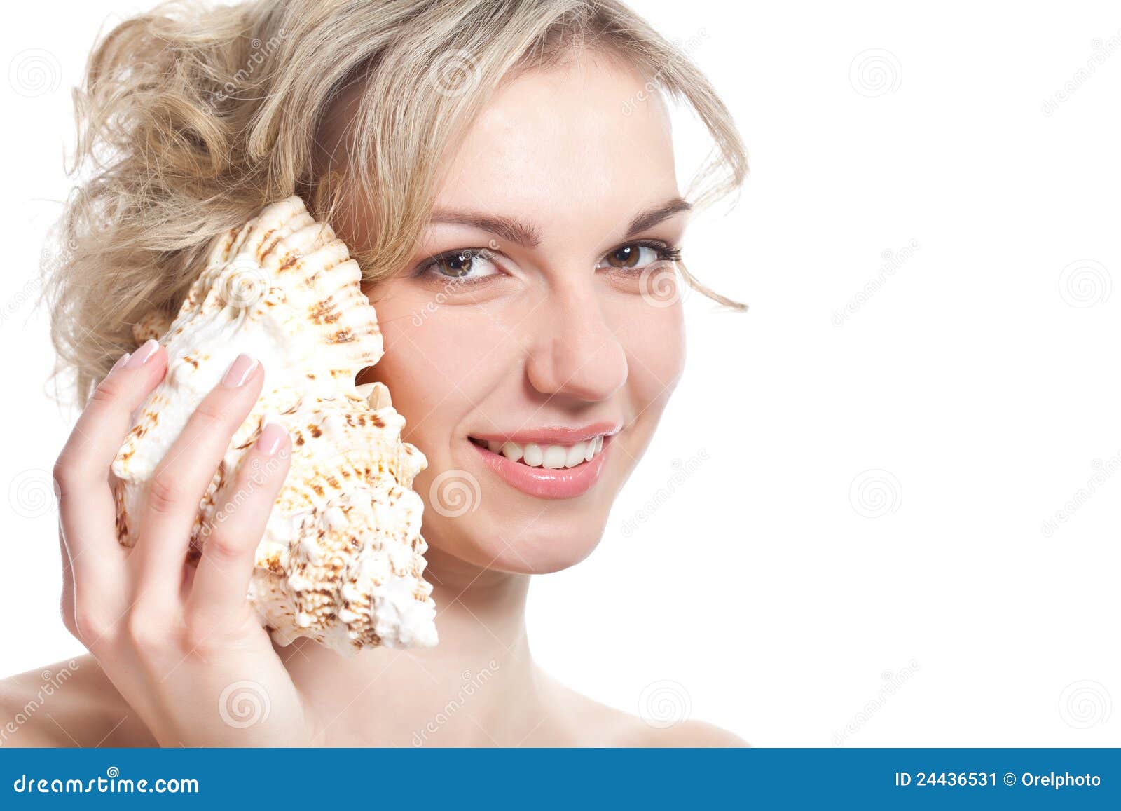 Woman is listening to the <b>sea-shell</b> - woman-listening-to-sea-shell-24436531