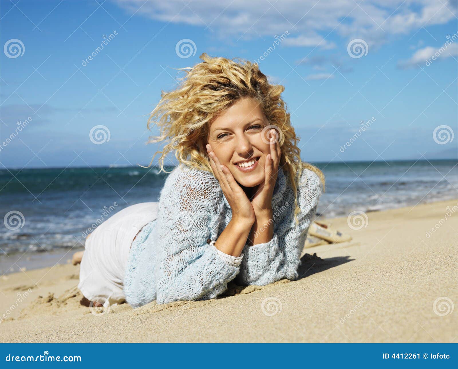 Young Girl On A Sandy Beach Stock Photo - Image of lying 