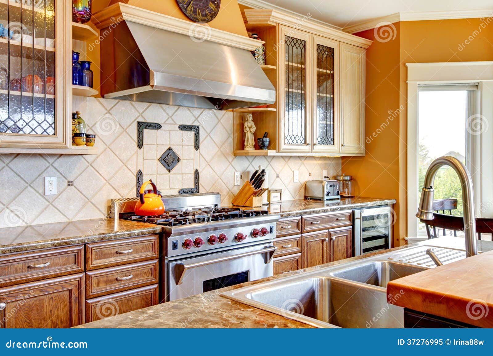 Wood Kitchen Room With Decorated Tile Backsplash Royalty Free 