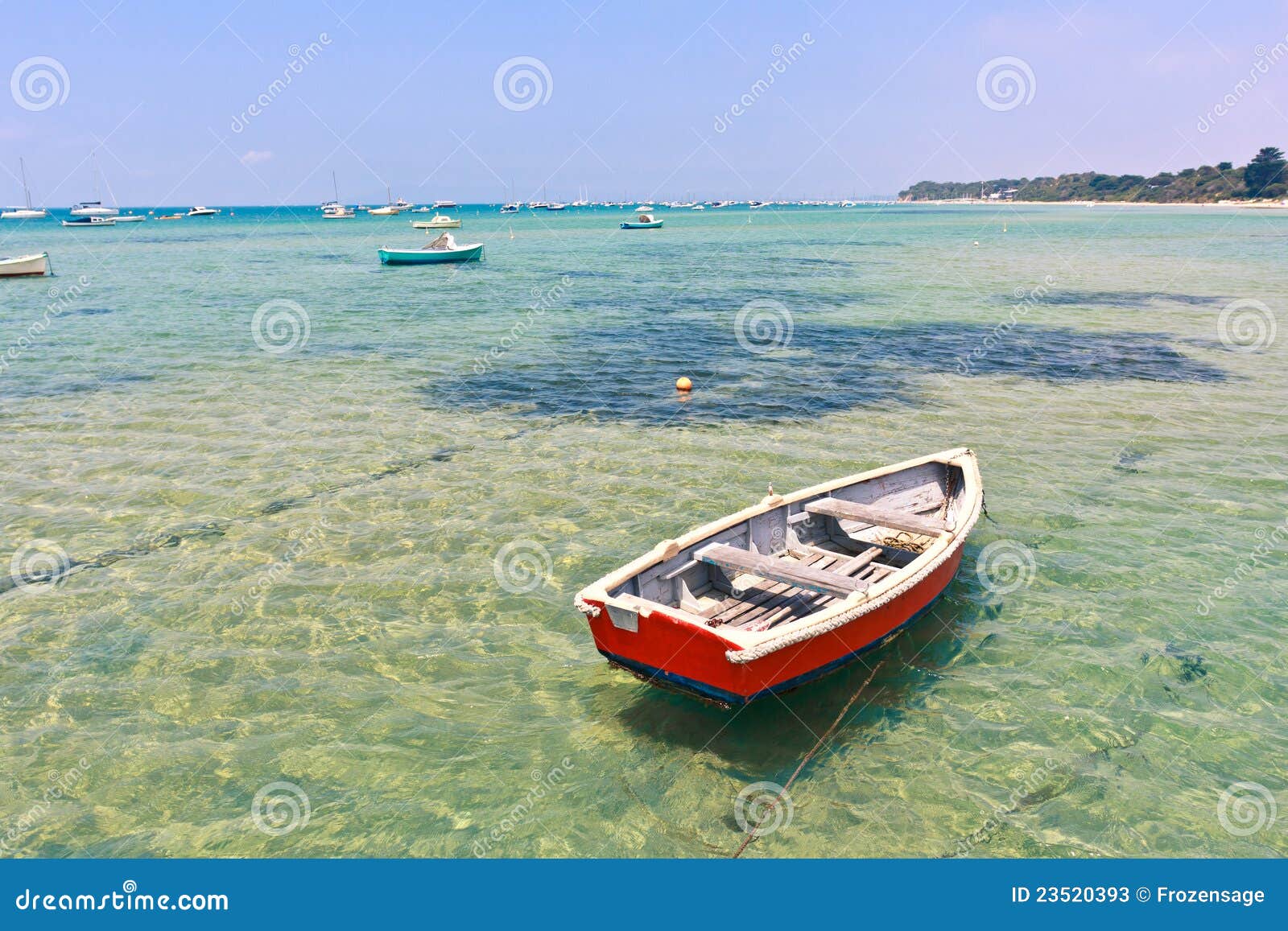 Wooden Boat In Shallow Water Stock Photos - Image: 23520393