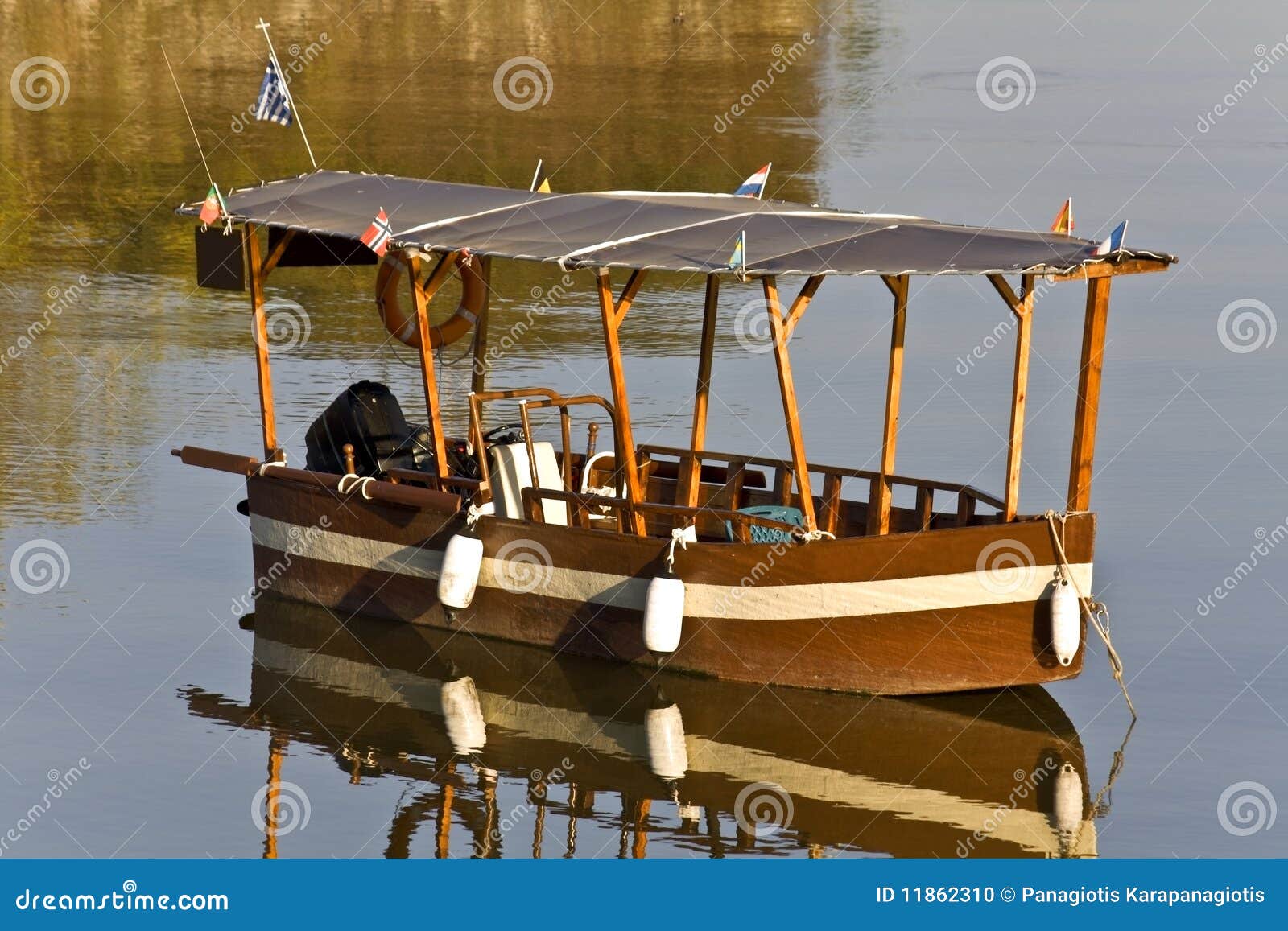 Stock Photo: Wooden old traditional greek boat at lake Kerkini