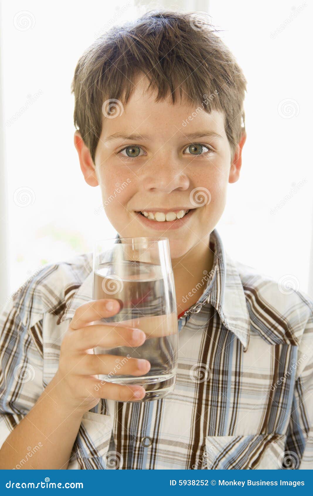 Young Boy Indoors Drinking Water Smiling Stock Photography Image 5938252