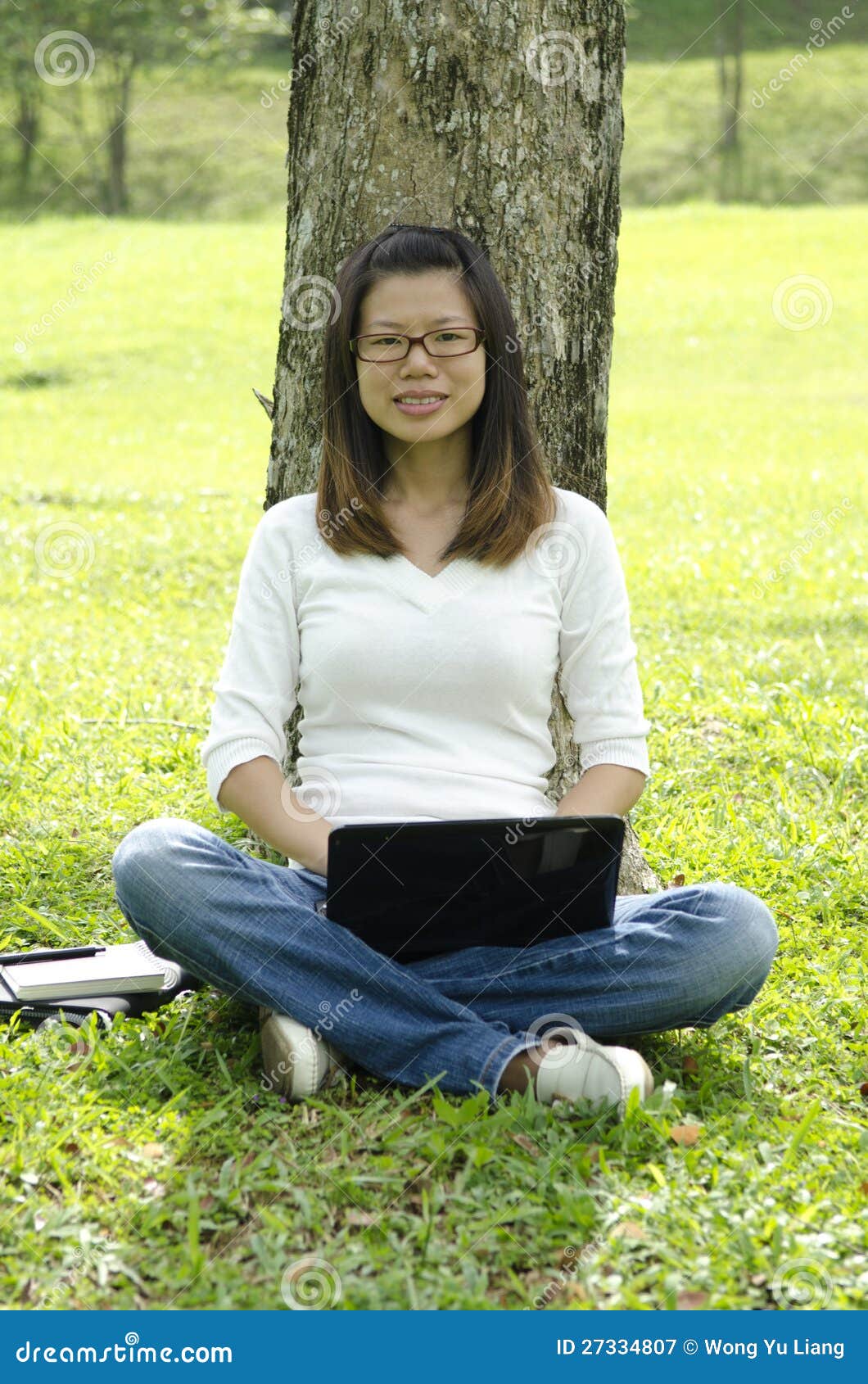Young College Asian Girl Using Laptop Outdoor