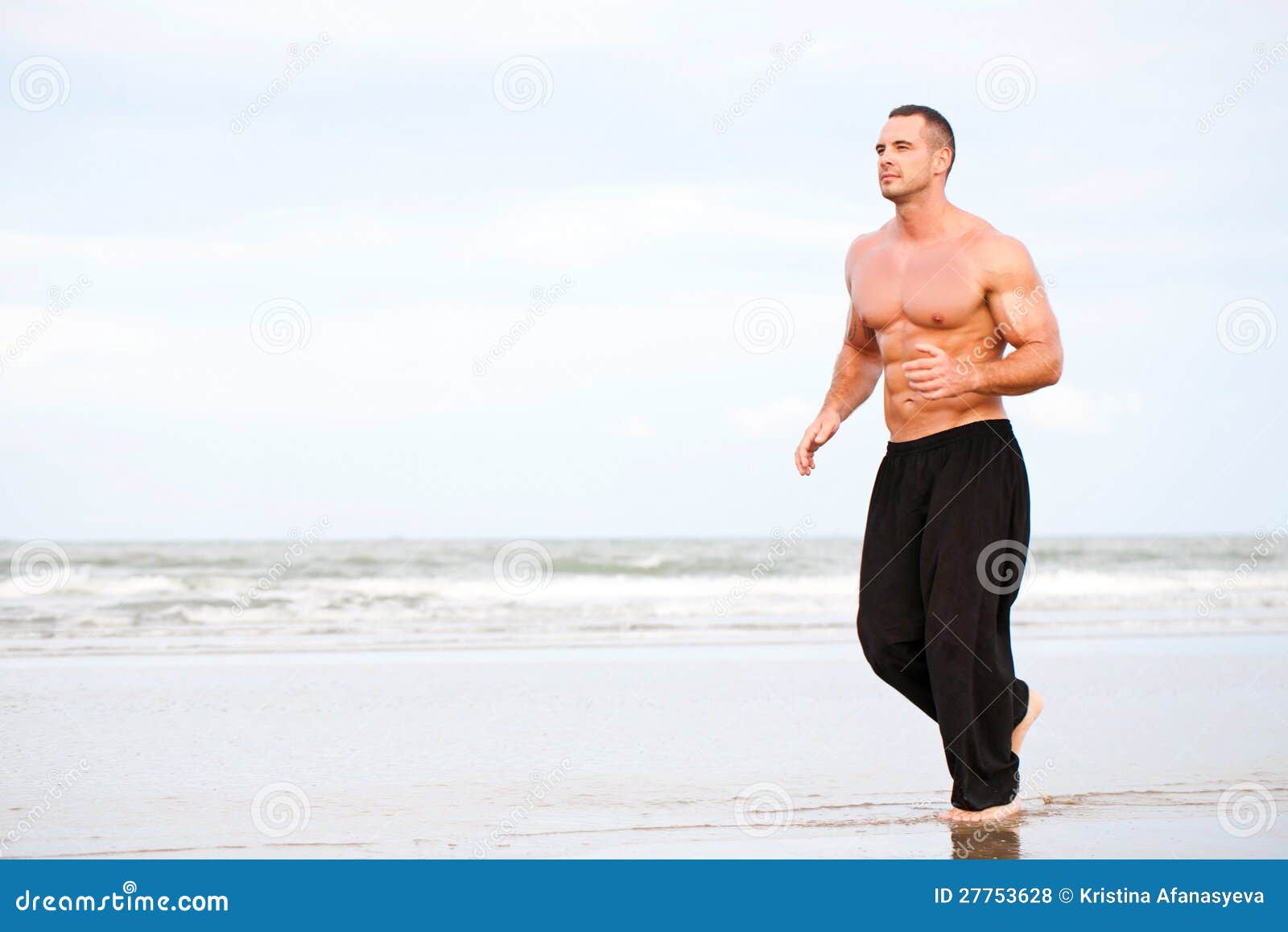 Young Handsome Muscular Man Running On The Beach Designjpg Young Handsome Muscular Man Running On The Beach Designjpg