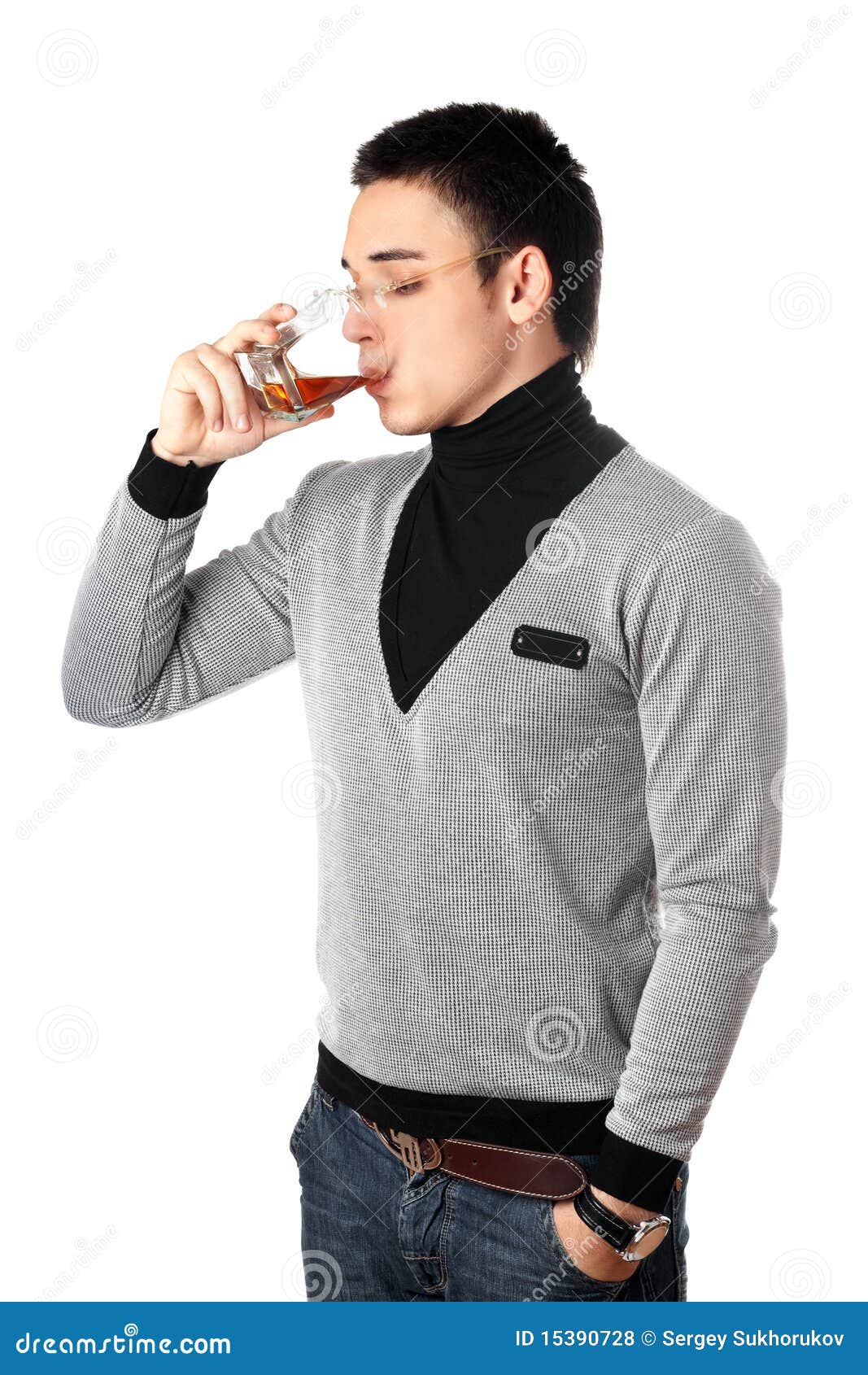 Royalty Free Stock Photos: Young man drinking whiskey Royalty Free Stock Photos: Young man drinking whiskey