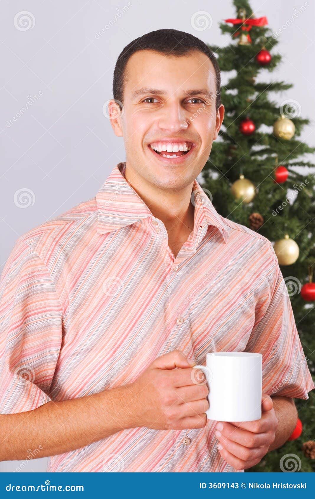 Young Man Holding Cup With Tea Stock Photos - Image: 3609143