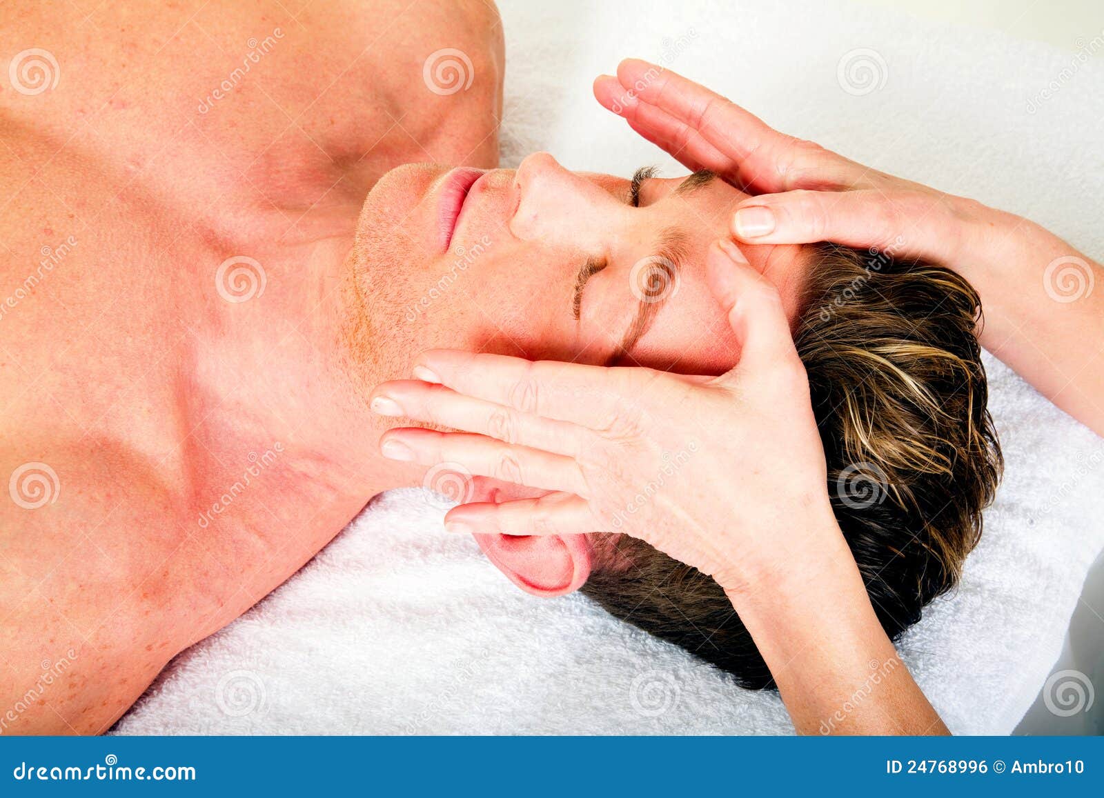 Young Man Receives A Face Massage Royalty Free Stock Image Image