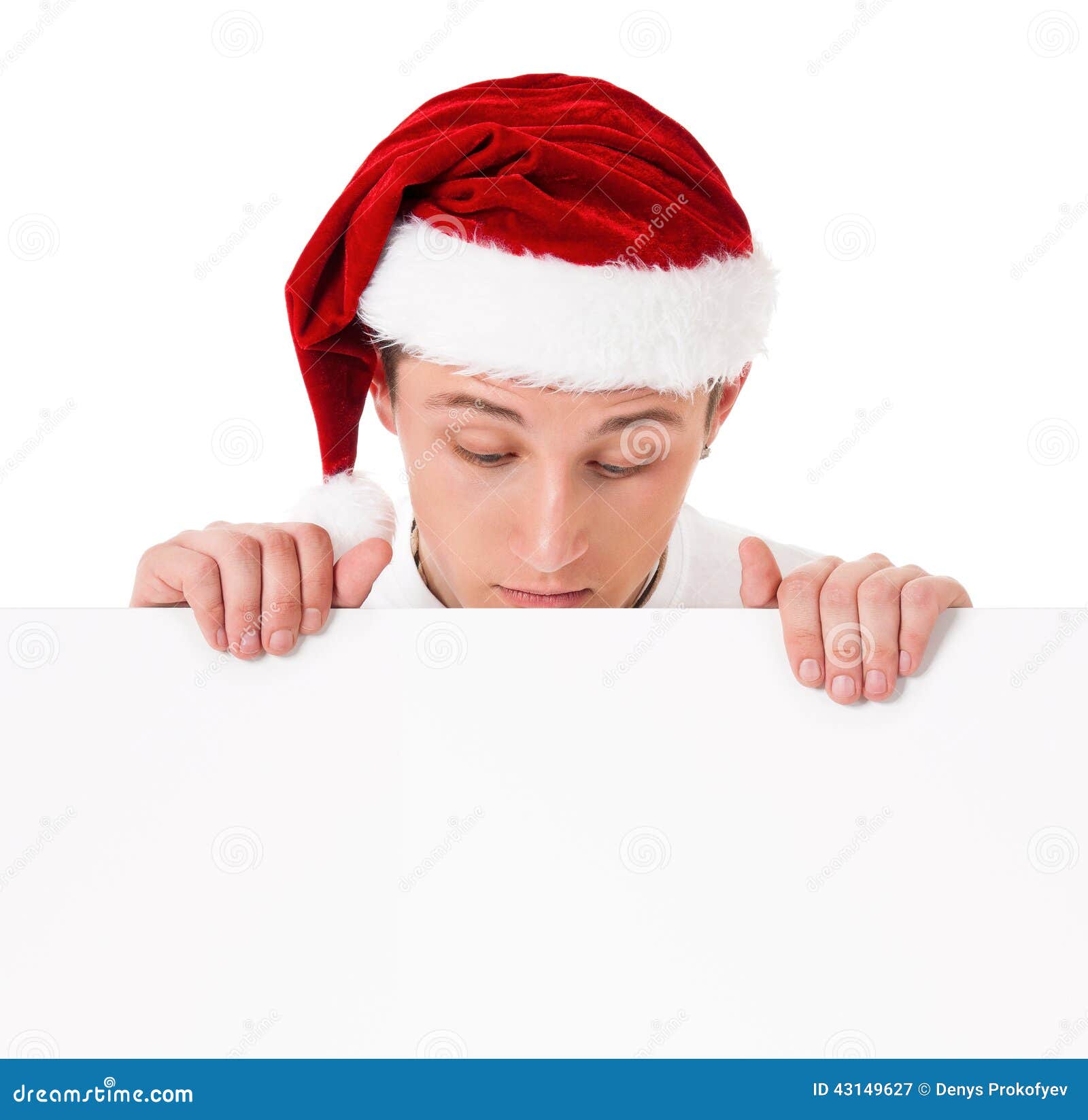 young man in santa hat stock photo image 43149627 young man in santa hat stock photo image 43149627