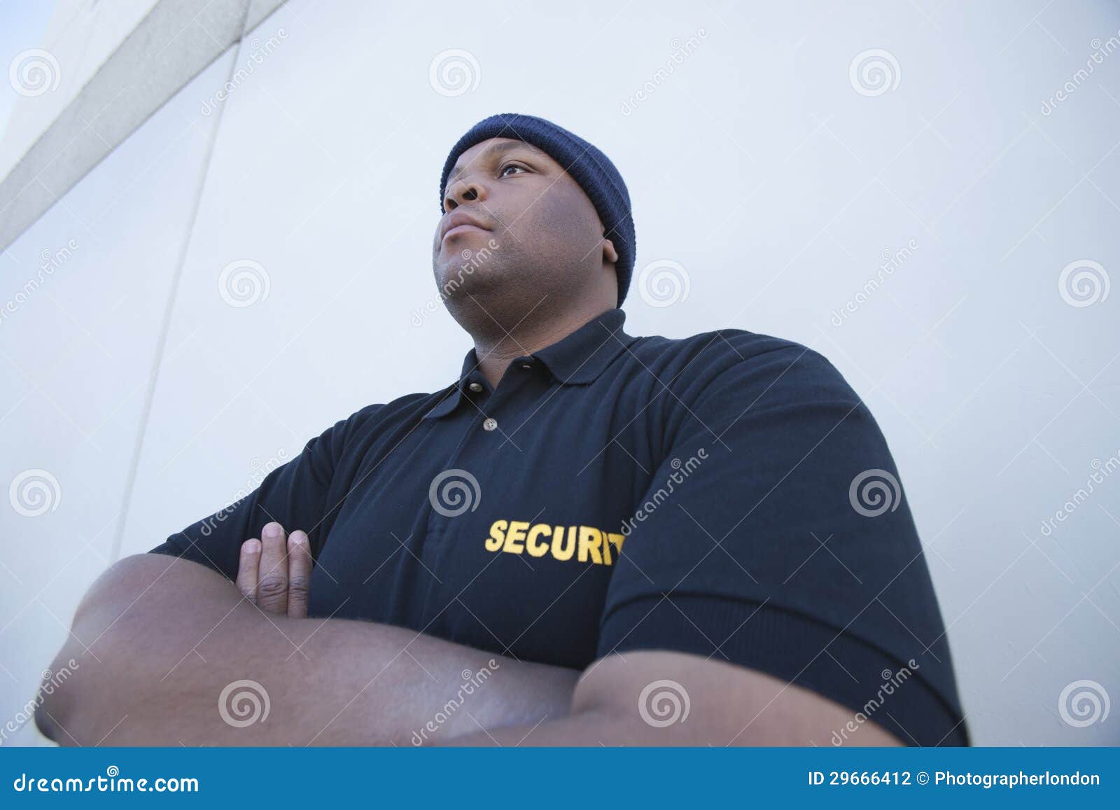 Young Security Guard By Wall Stock Photography Image 29666412