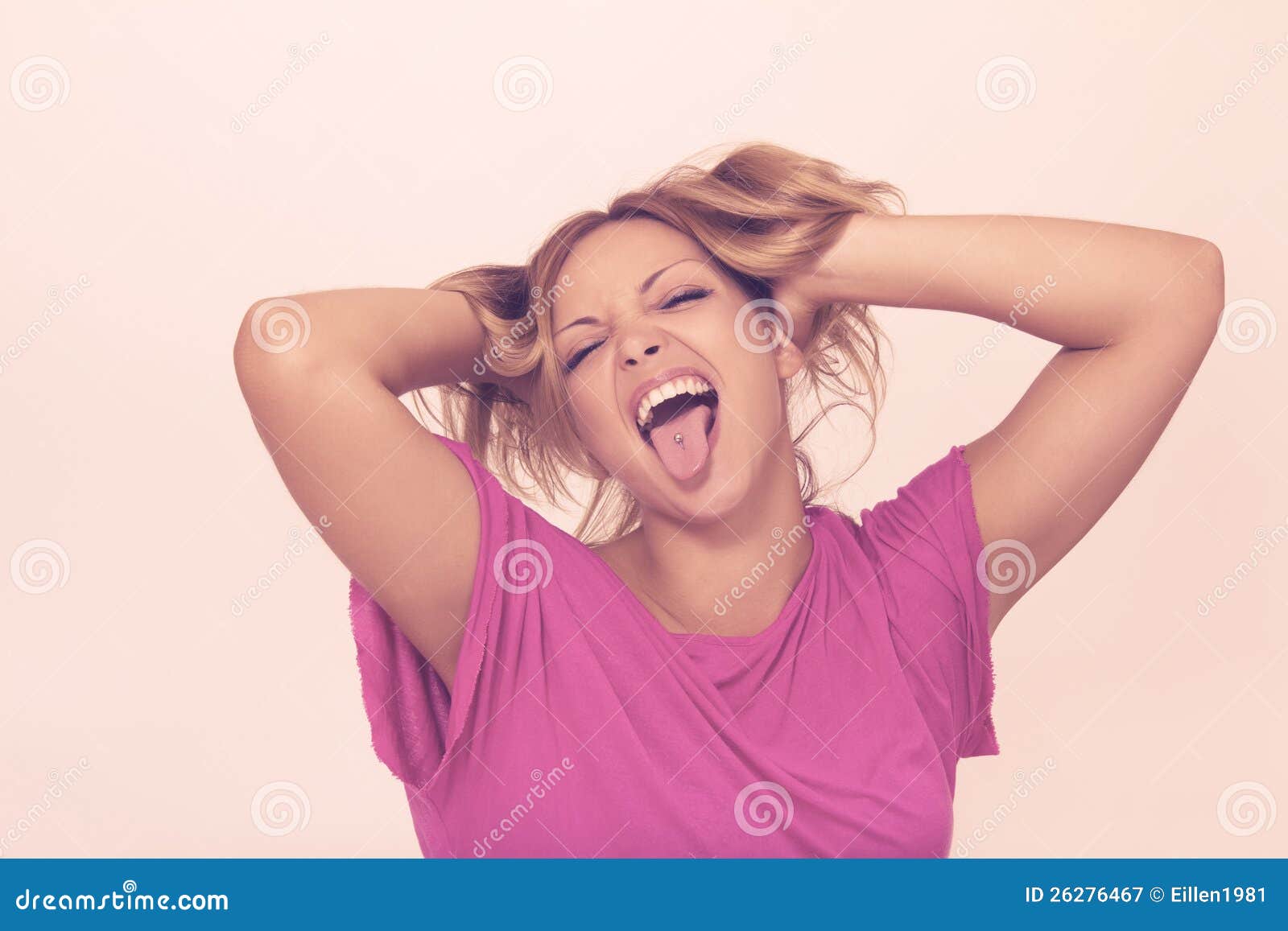 Royalty Free Stock Photography: Young woman making funny faces