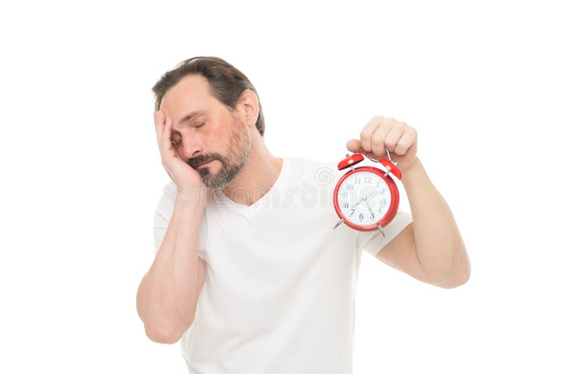 Будит себя руками. Будильник на руке. Жирный мужчина держит будильник. A picture of a man holding an Alarm Clock.