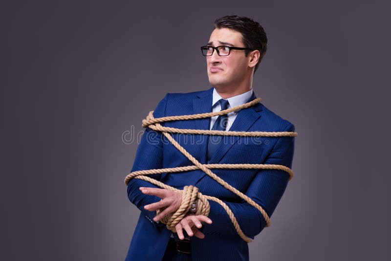 Tied up businessman. Tie something with a Rope.