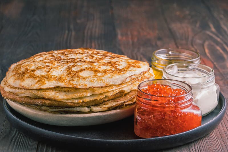 Масленица блины с черной икрой