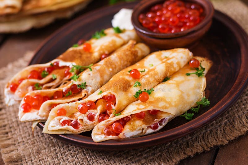 Блины с красной икрой и сливочным