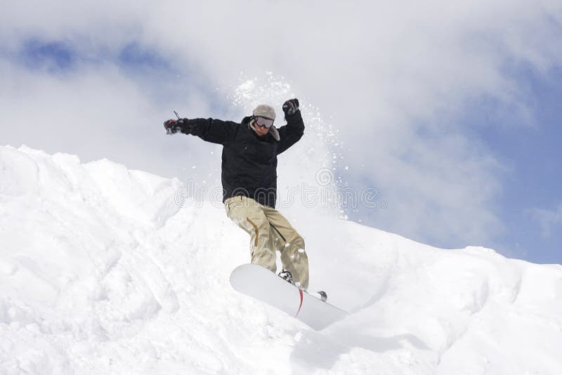 Снежком катание. Snowboarding stock photo.