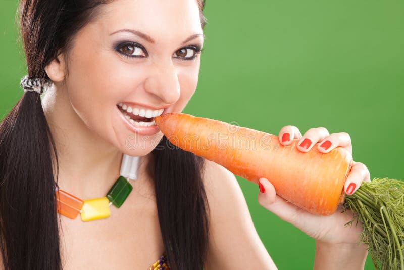 Naked Girl Hides Behind Carrot Stock Photo