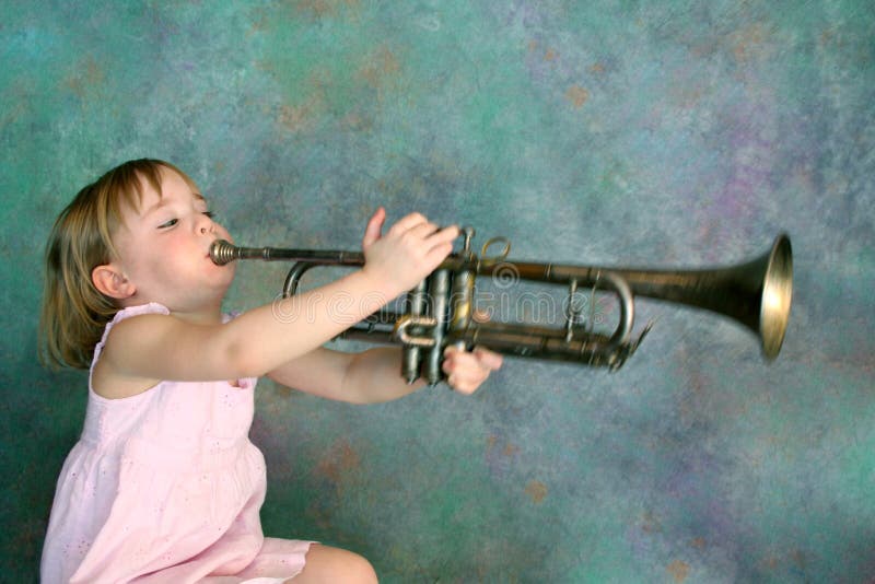 Premium Photo A boy plays the trumpet. A handsome teenager boy in a white T-shir