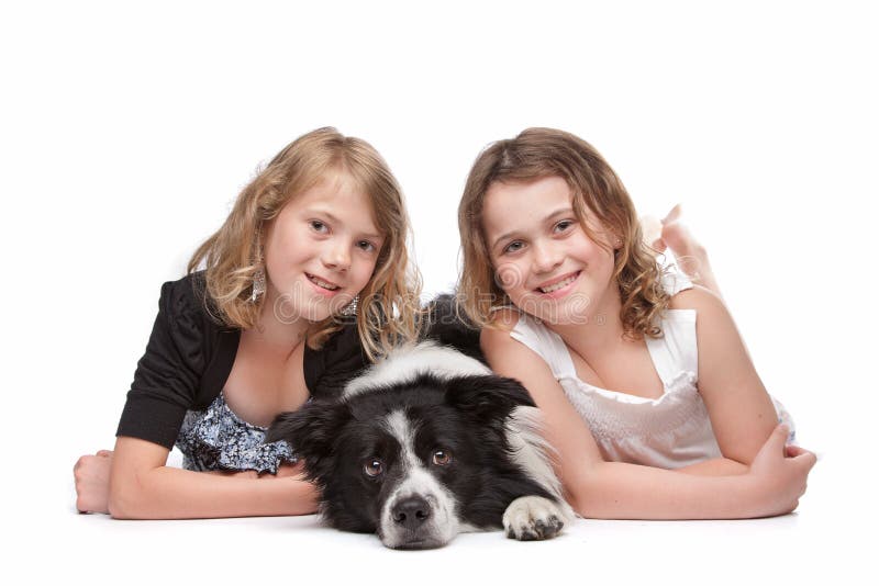 Girl two dog. Две девочки и собака. Две девушки две собаки. Девочка с щенком стоковое изображение. Девушка с колли.