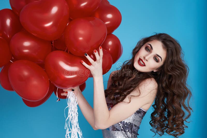 Sexy young female balloons tied while