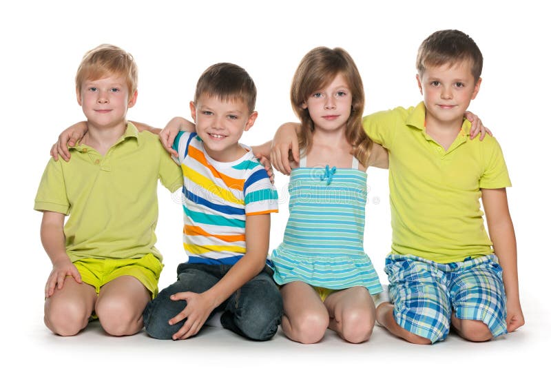 Children on White background. Kid White background. 4 Boys White background for Kids. Portrait of a little boy close-up in the Studio on a White background. Concept Happy childhood, Family and people. Isolated.