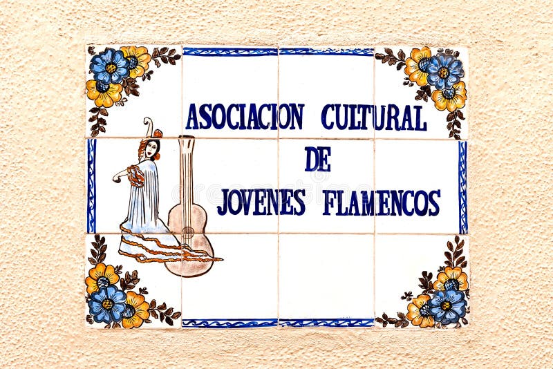 Знак сделанный из плиток как реклама для школы фламенко Стоковое Фото -  изображение насчитывающей язык, цветок: 52664798