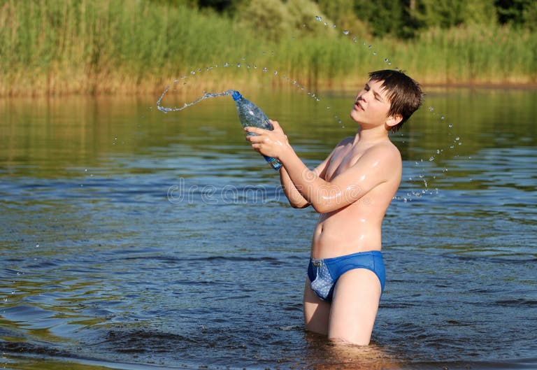 Boy by the lake stock image. Image of nature, caucasian - 33377539