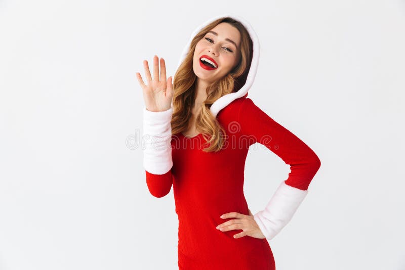She s wearing her red. Delighted woman New year in waving Dress.