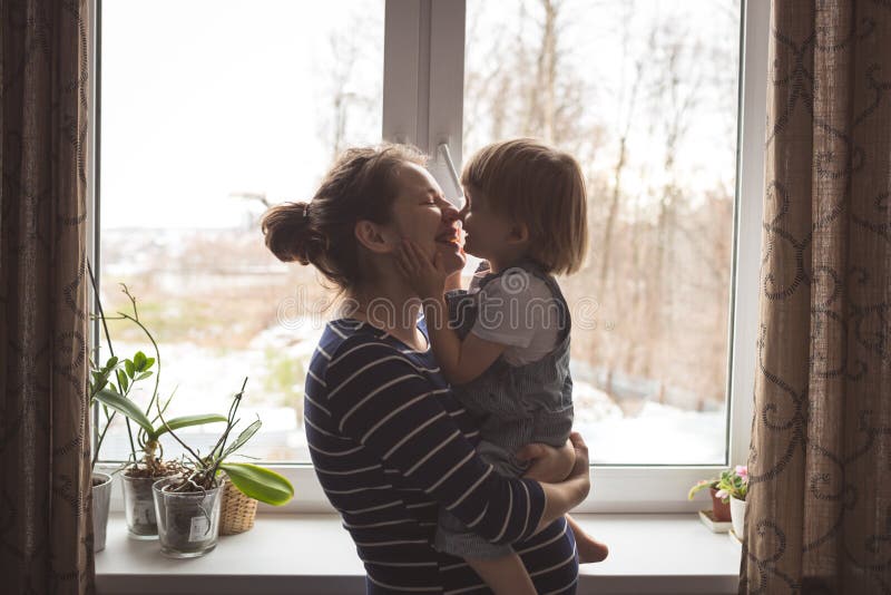 Mom with her sons friend. Ребенок целует маму в щечку. Mom with her sons friend. Mom with her sons friend. Mom with her sons friend.