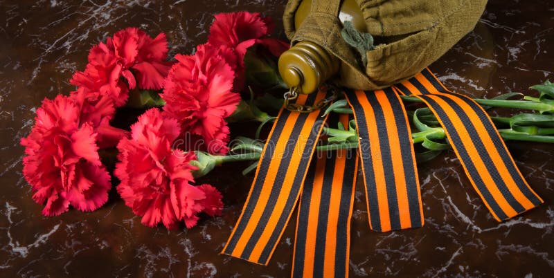 Гвоздики цветы на вечном огне
