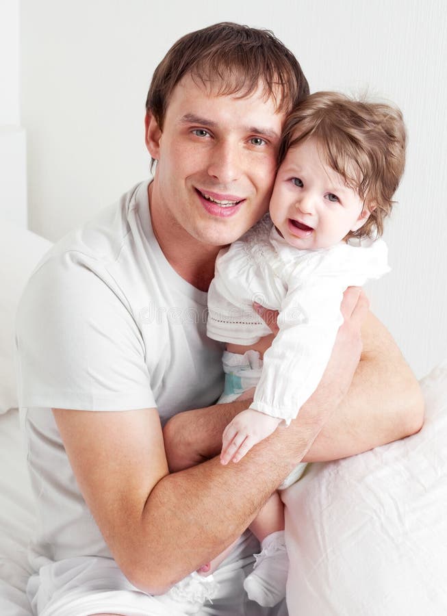 Включи папа доча. Father and Baby in Home stock photo. Male Family.