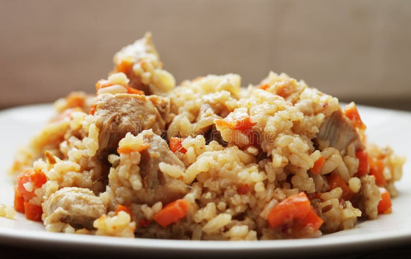 Плов с куриными сердечками