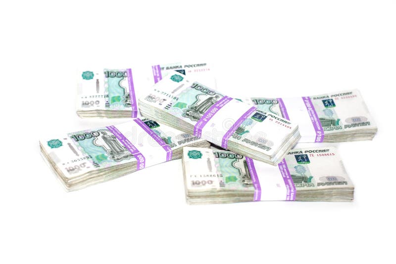 Бумажные СТО рублей лежат на пластиковой карте. 1000 Рублей лежит на пустой банке.
