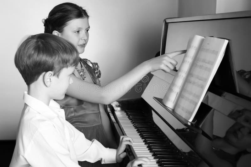 Sister play piano