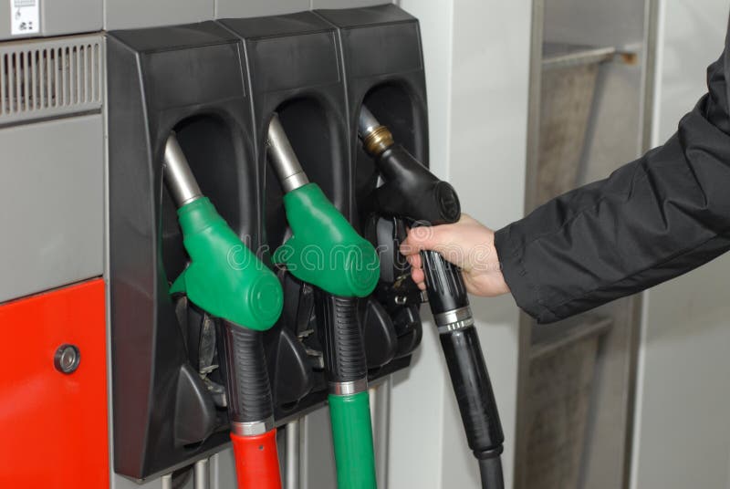 Заправка колонка бензин. Stock photo: Gas Pump Nozzle. Топливо 3 поколения