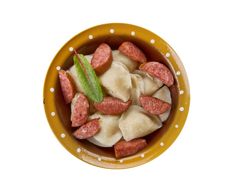 Сотейник Crockpot Pierogi с Kielbasa стоковые изображения rf.