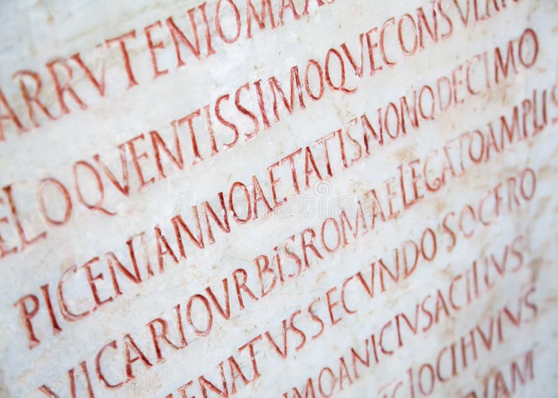 Латынь Сток фото. Latin writing. Pre Christian. Chatgpt logo writings on the background. Итальянская латынь