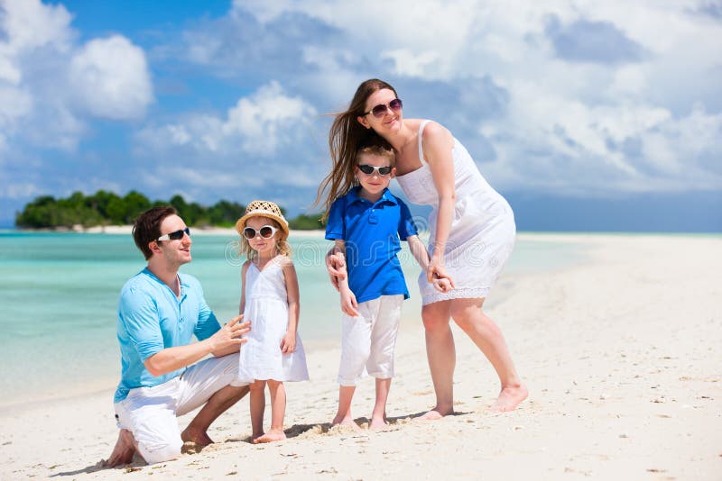 A Happy Family on Holiday by the Sea. Дети кост